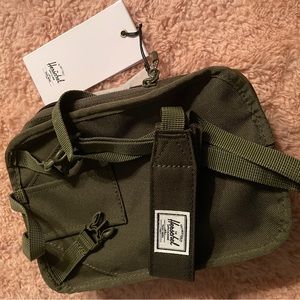 NWT Herschel Supply Co. Cross body bag in dark green. Never used.